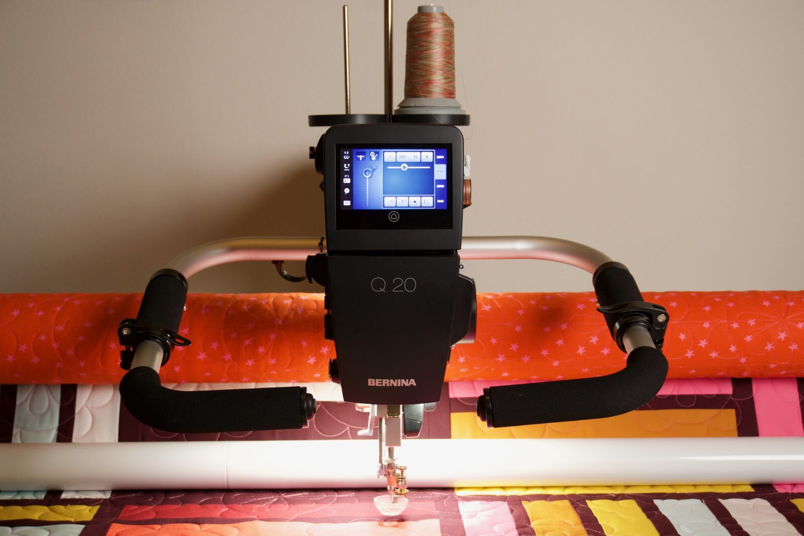 Bernina Q20 longarm machine head facing forward on the frame