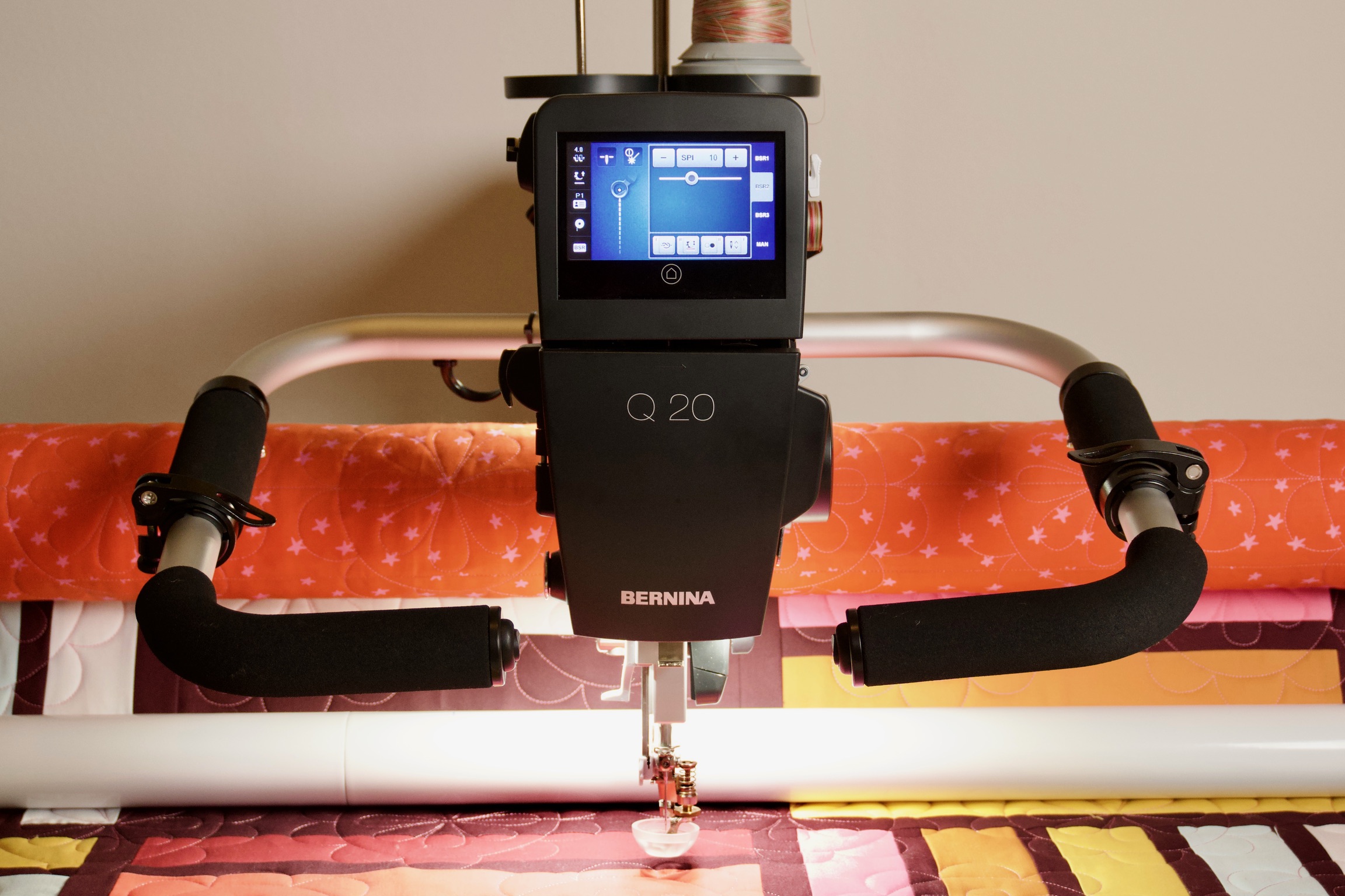 Bernina Q20 longarm machine head facing forward on the frame